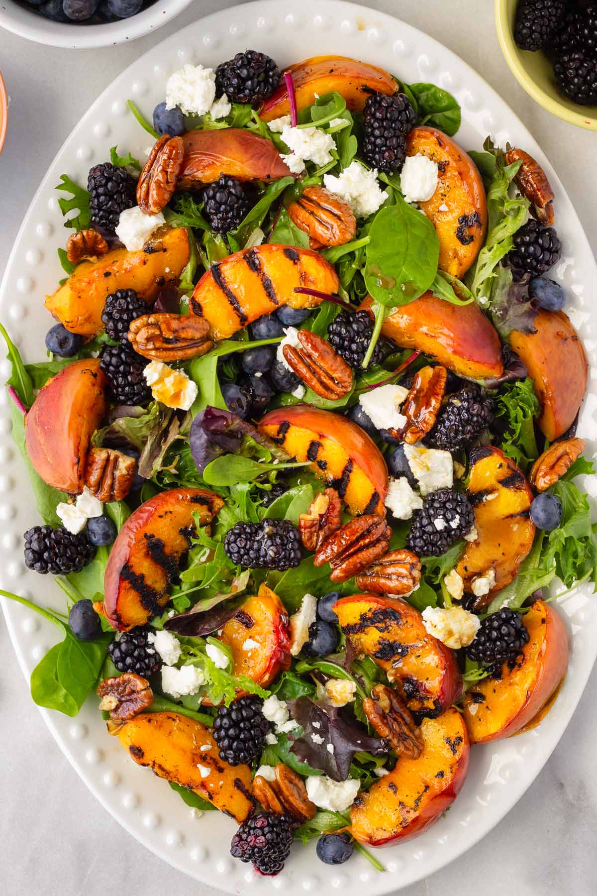 grilled peach salad platter with berries