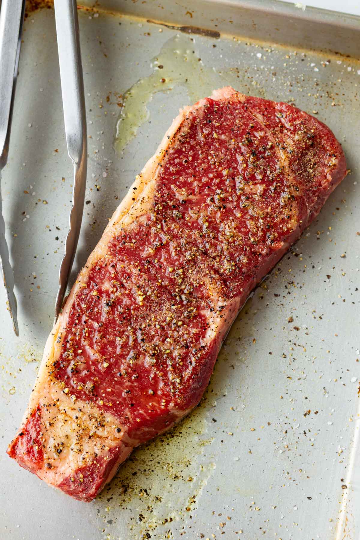 seasoned ny strip steak before cooking