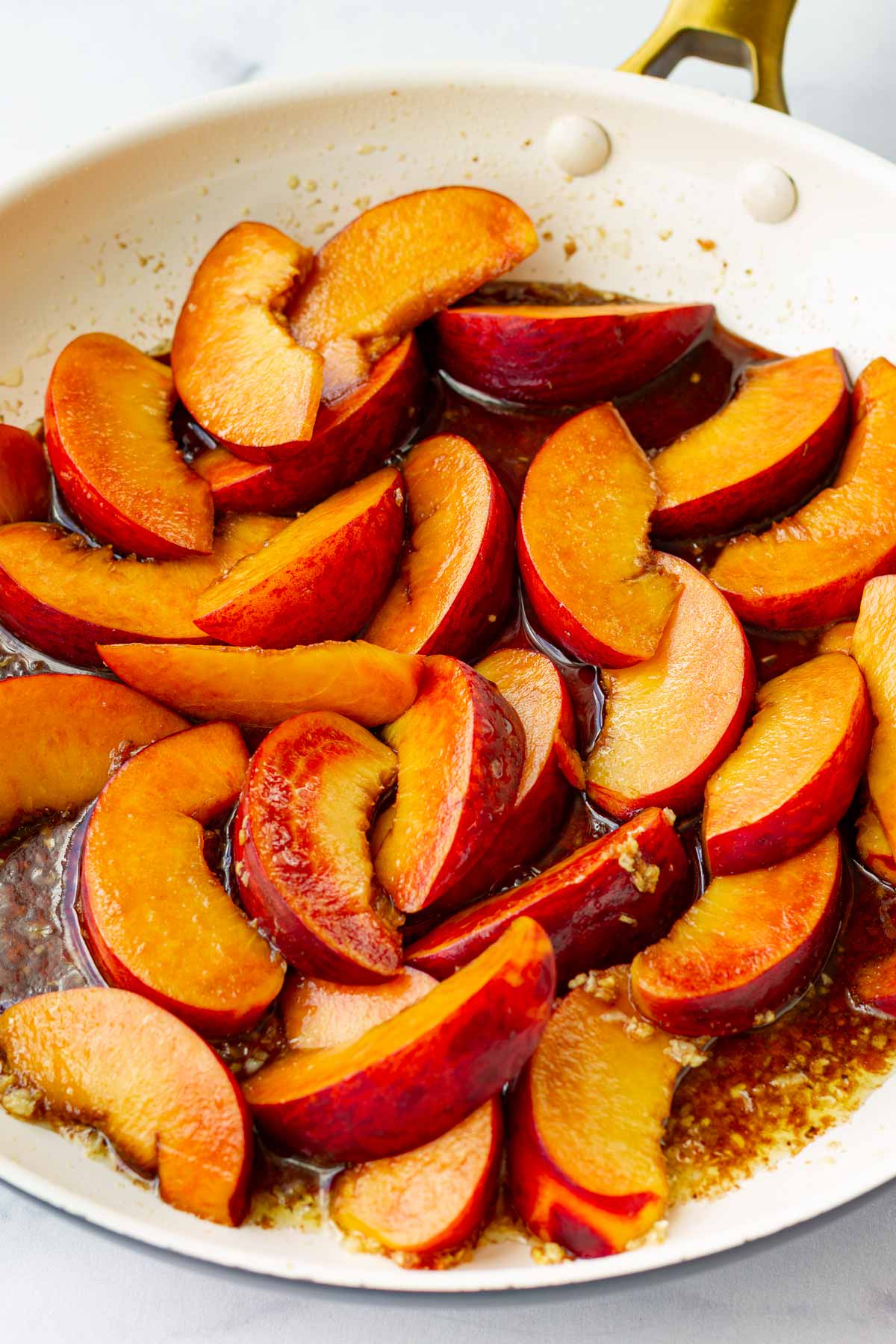cooking peaches in skillet