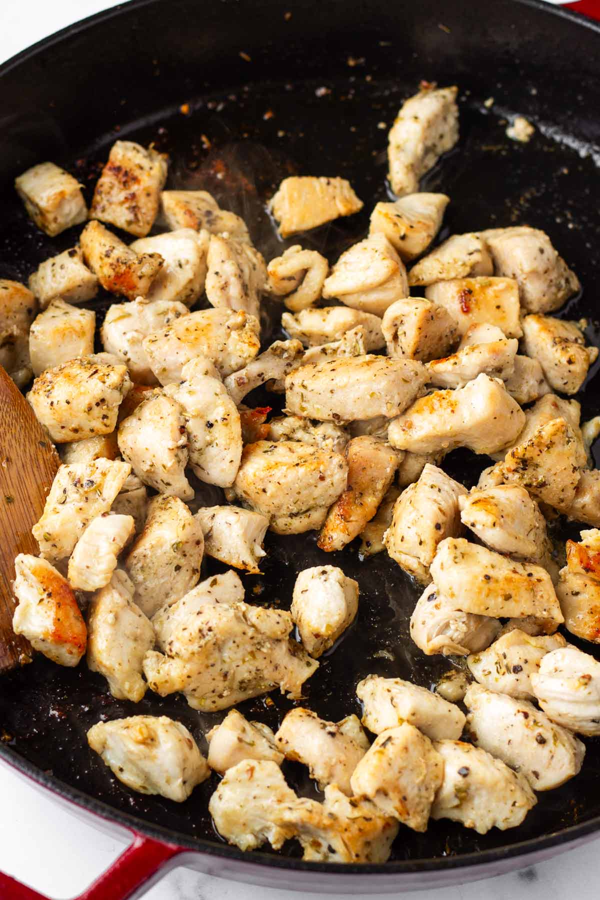 cooked and seared chicken in skillet