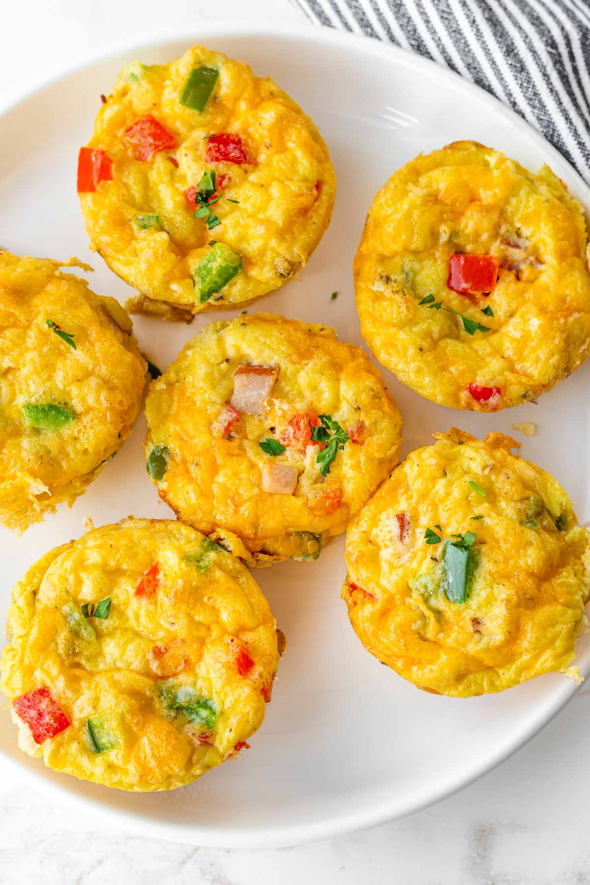 five denver omelet egg muffins on a plate