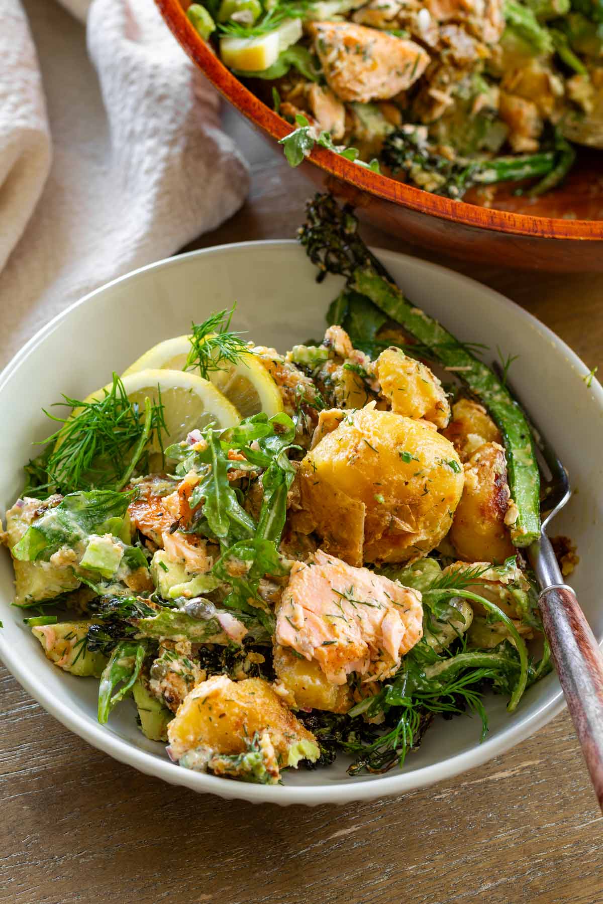 serving of salmon potato salad in a bowl