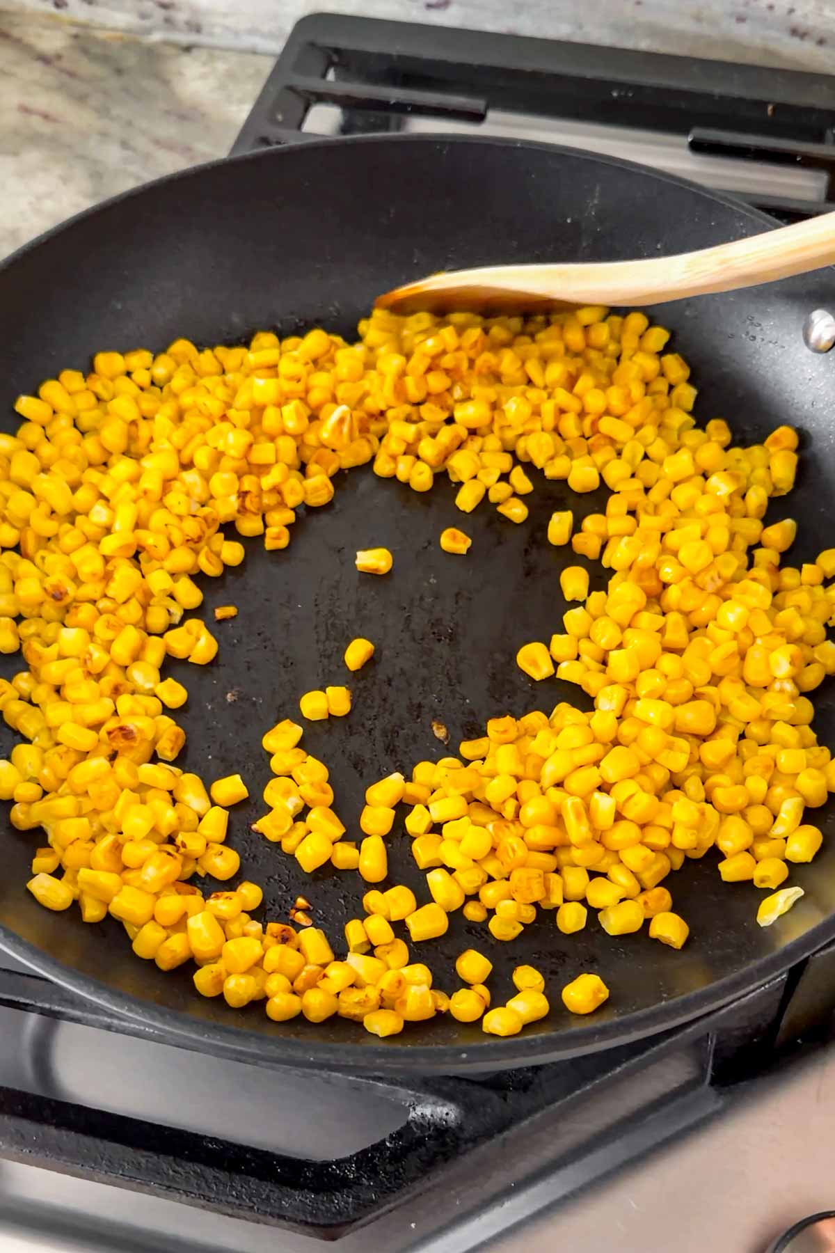 sauteing corn in skillet