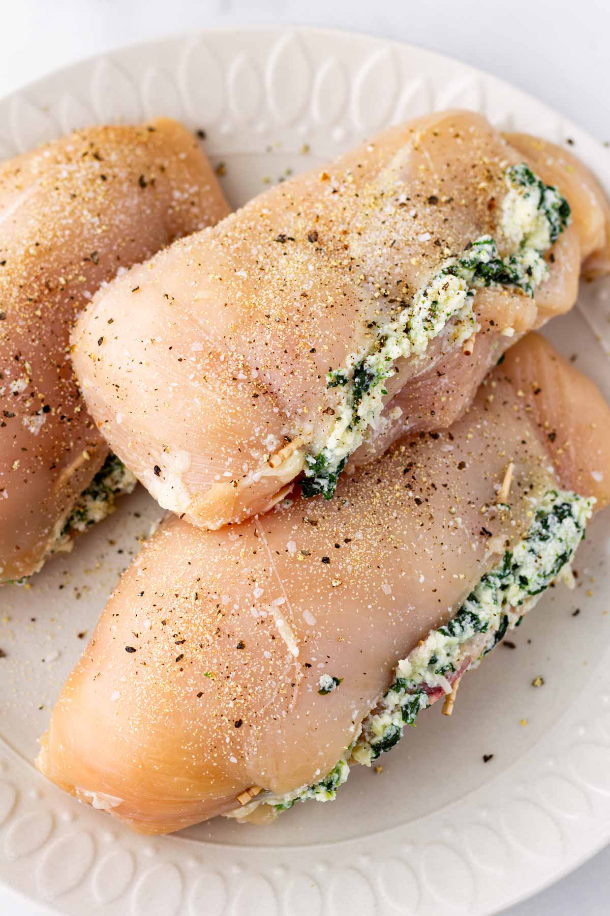 seasoned and secured chicken before cooking