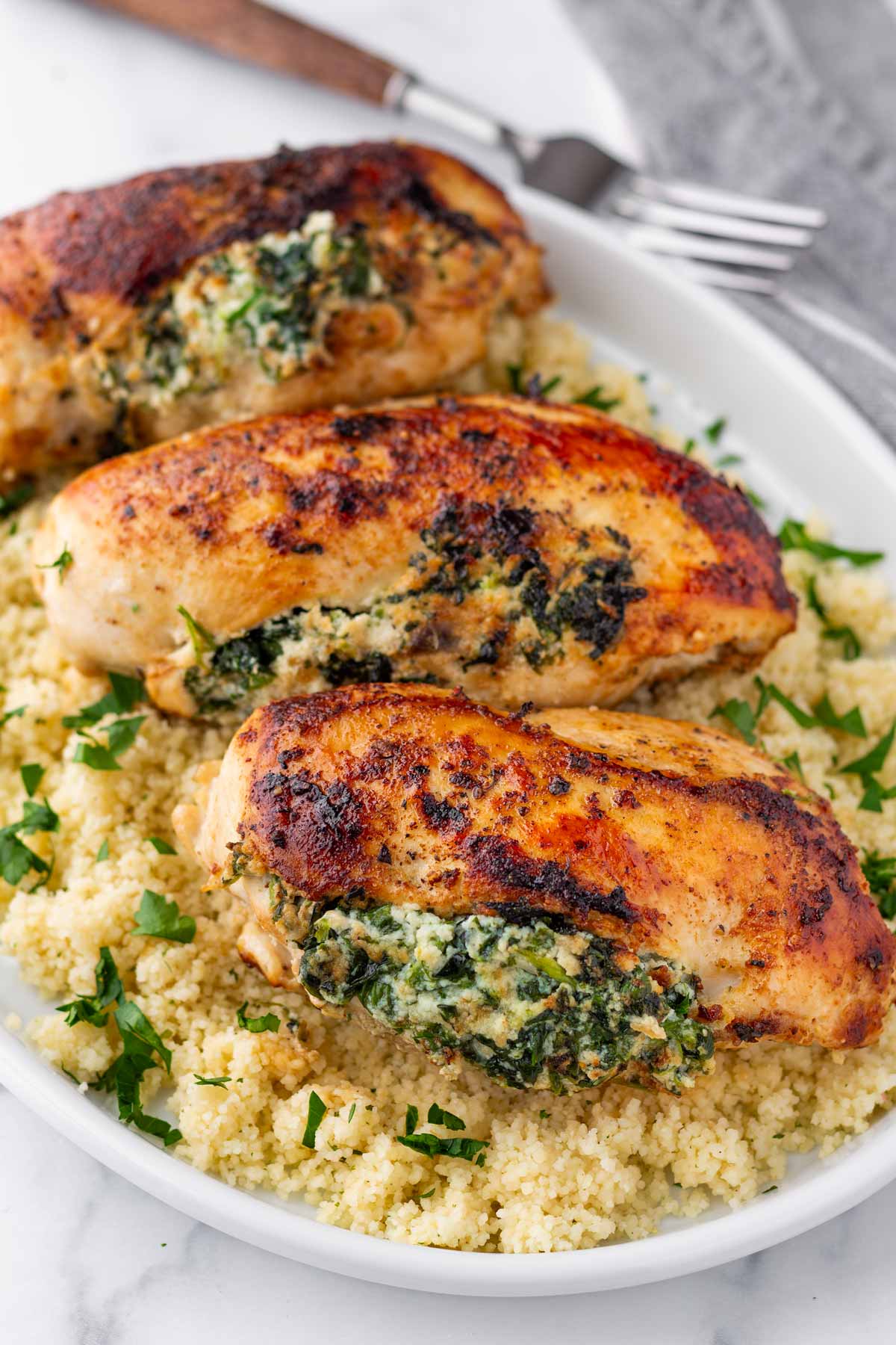 spinach stuffed chicken over couscous