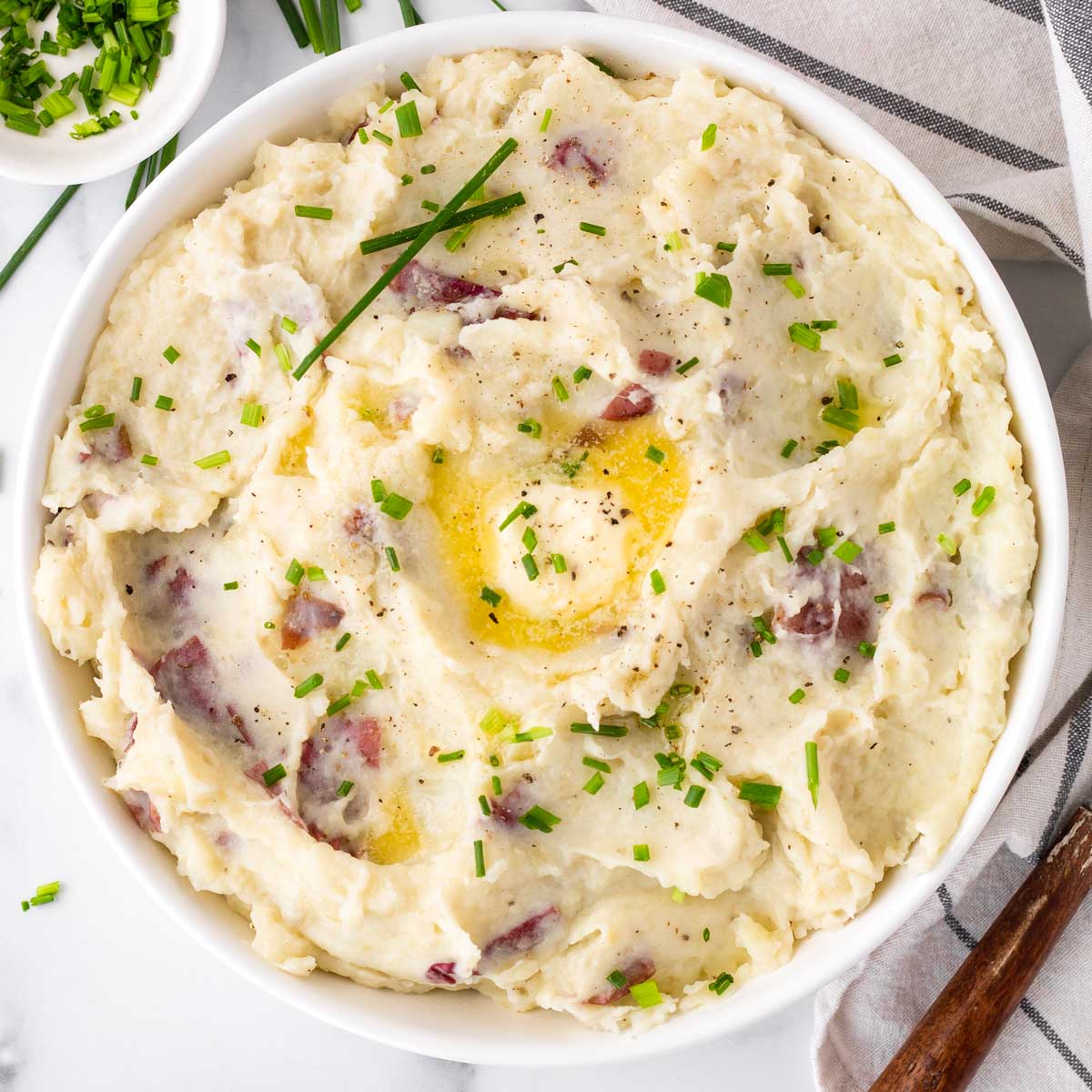 bowl of red skin mashed potatoes with fresh chives