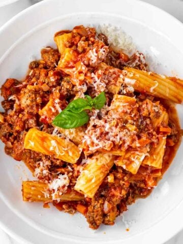 rigatoni bolognese on a plate