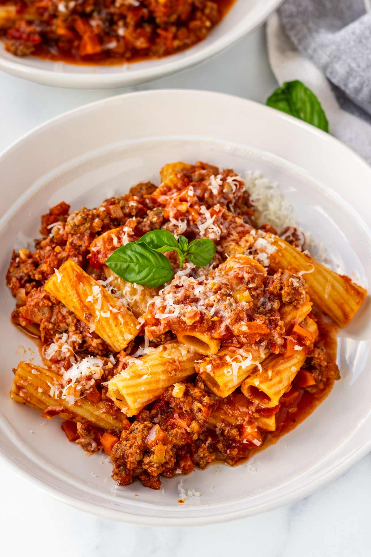 a comforting bowl of rigatoni with bolognese sauce