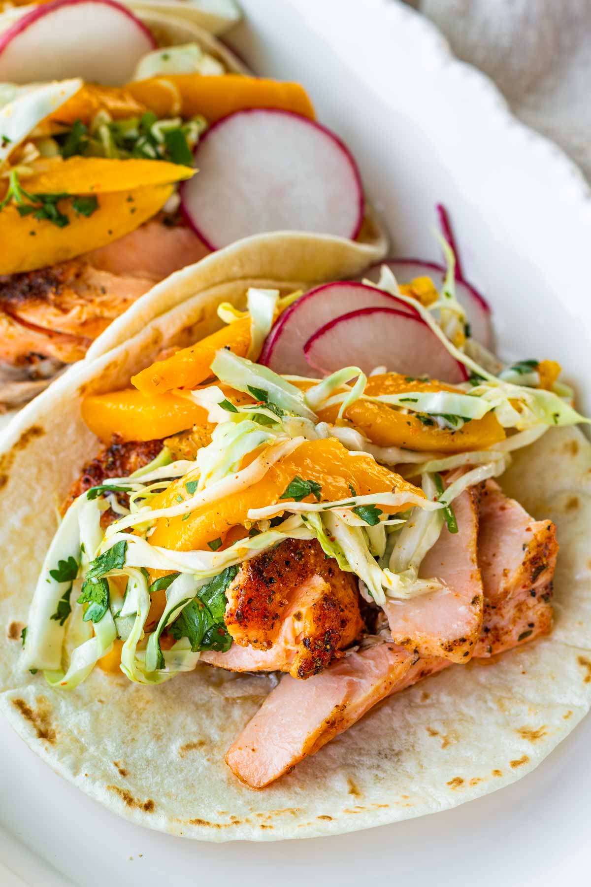 salmon tacos with mango coleslaw