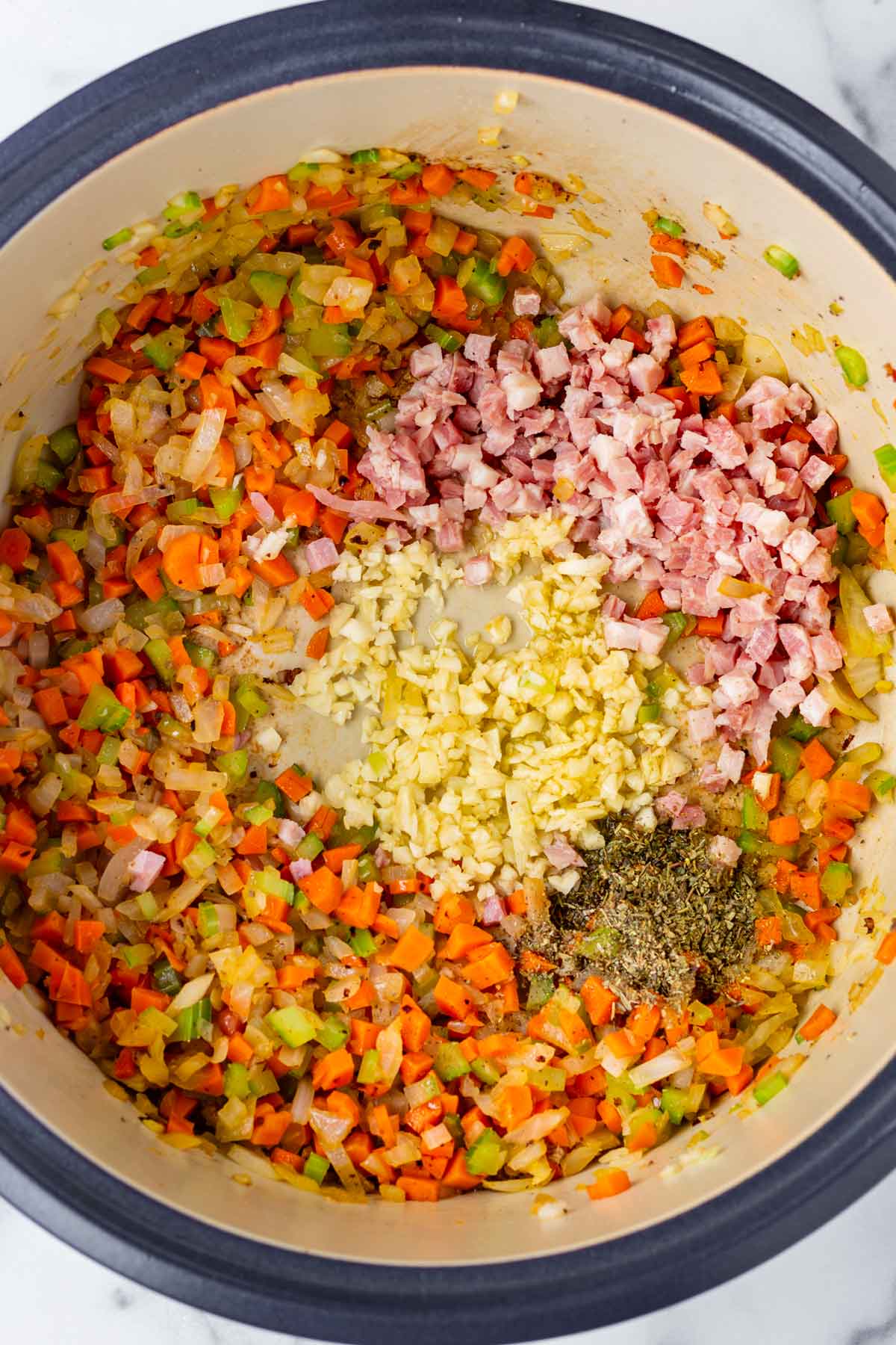 sauteing sofrito, garlic, pancetta, and herbs