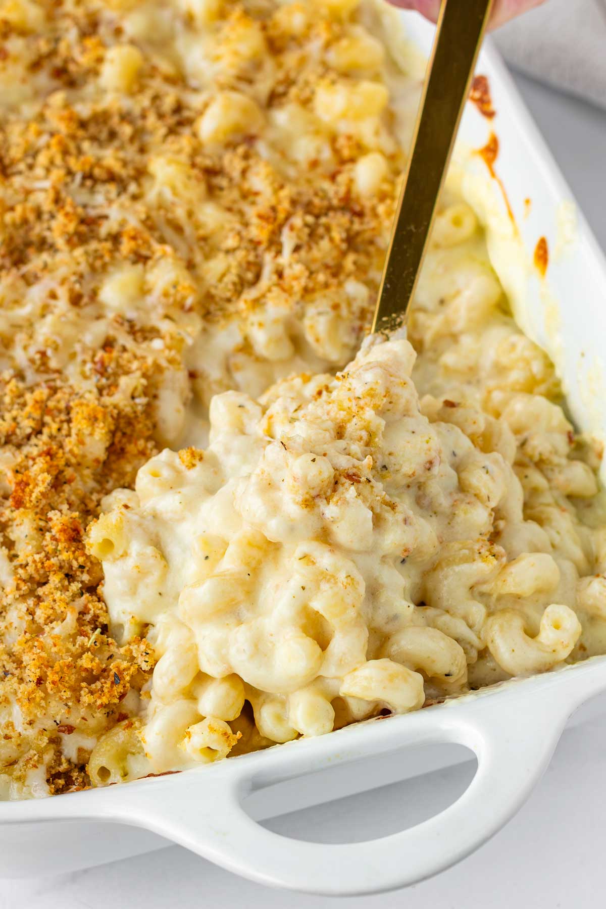 scoop of white cheddar mac and cheese