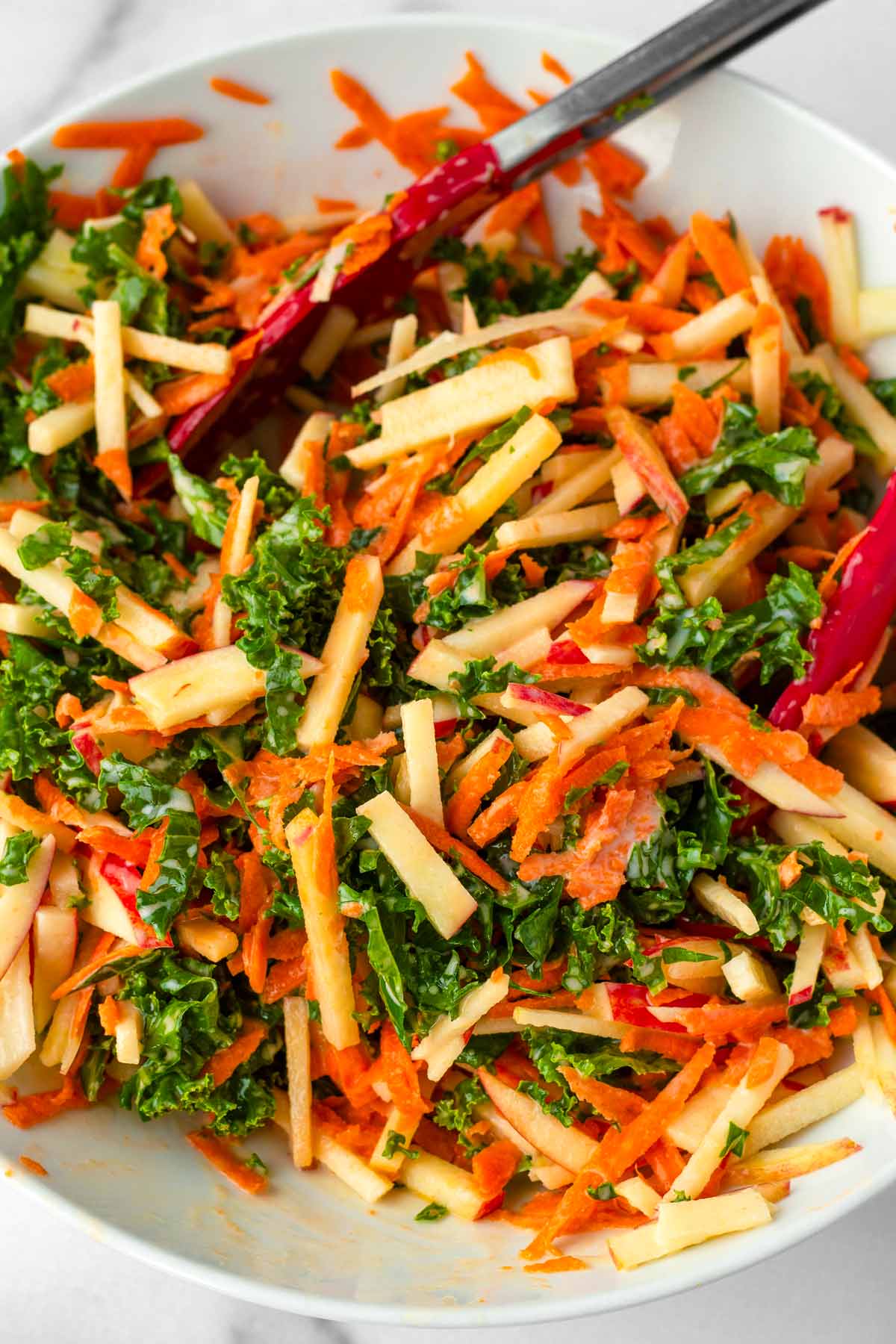 finished kale and apple slaw with creamy maple dressing