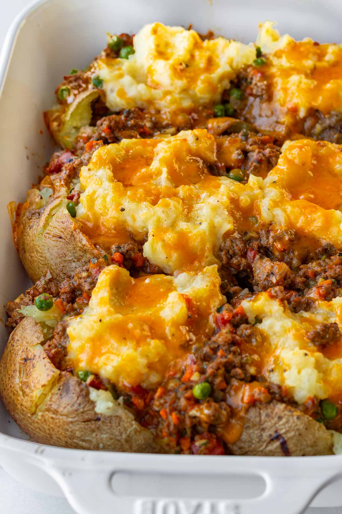 shepherds pie baked potatoes in casserole dish