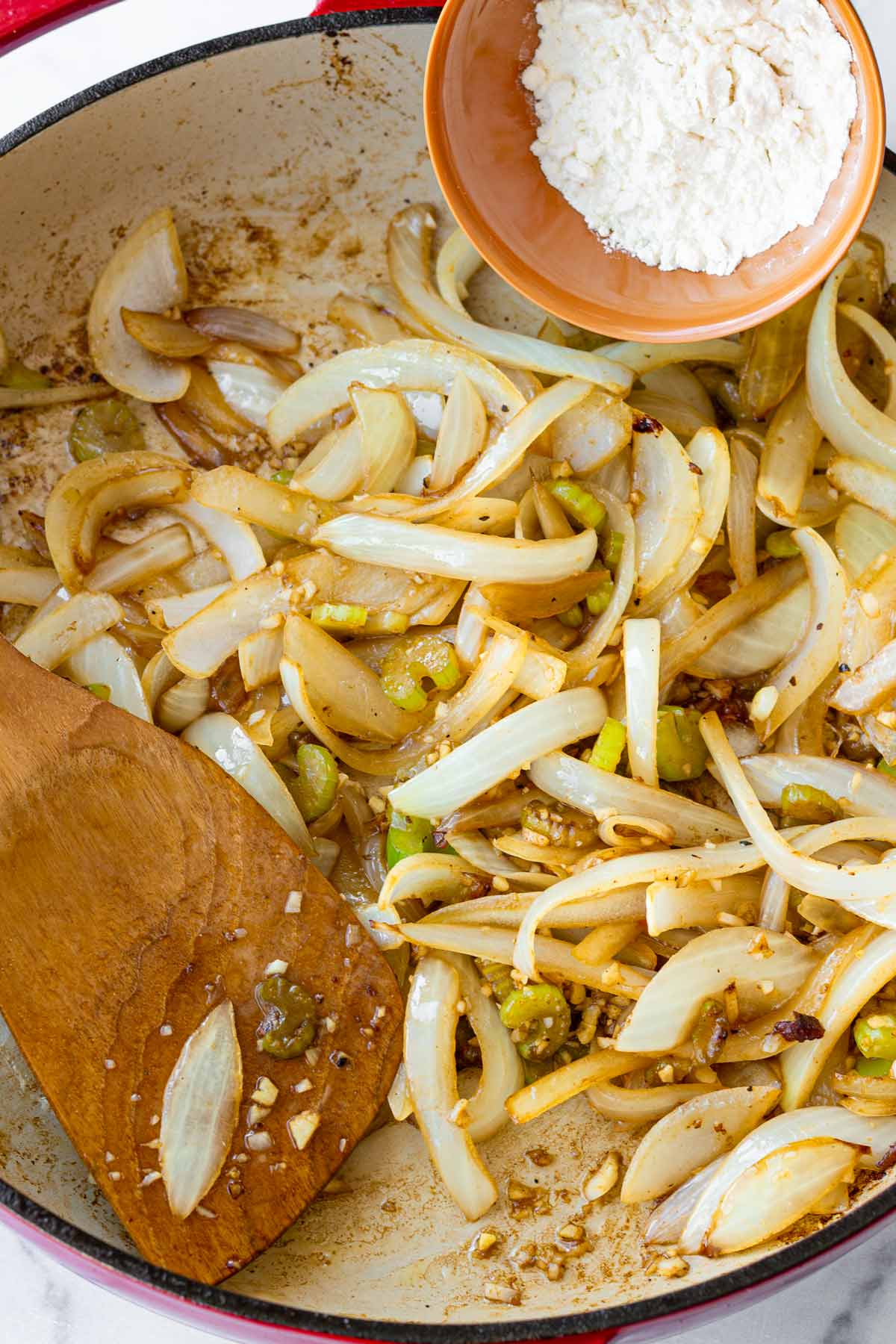 sauteing onions and aromatics and adding flour