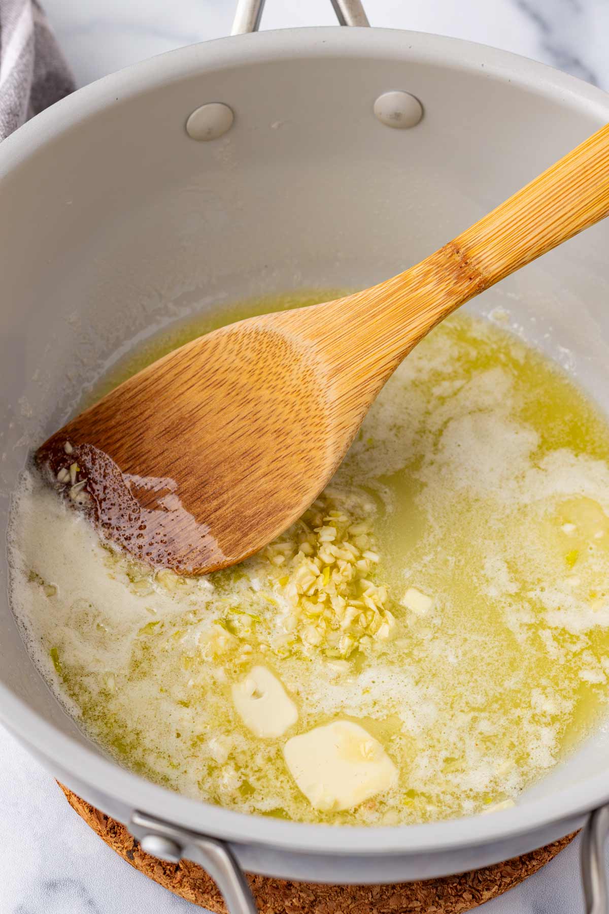 cooking garlic in butter in the pan