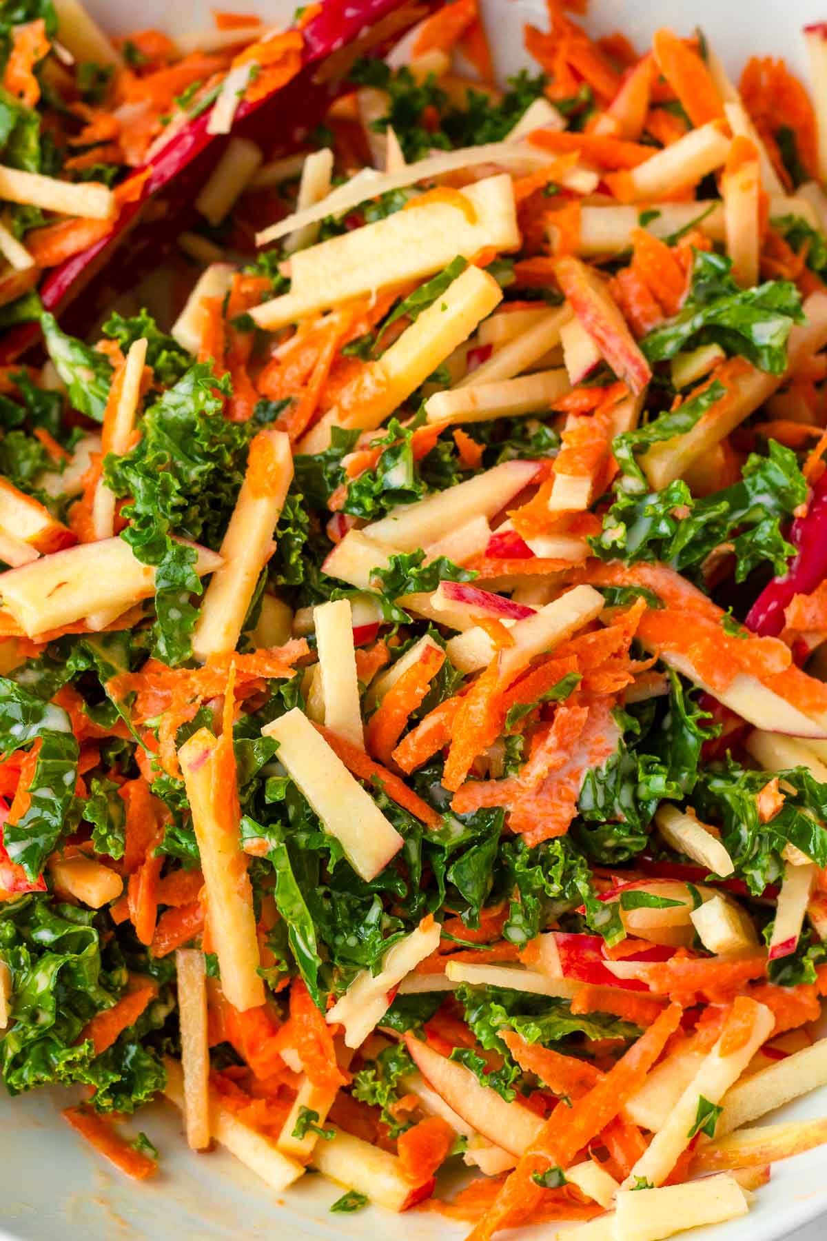 finished kale and apple coleslaw on bowl