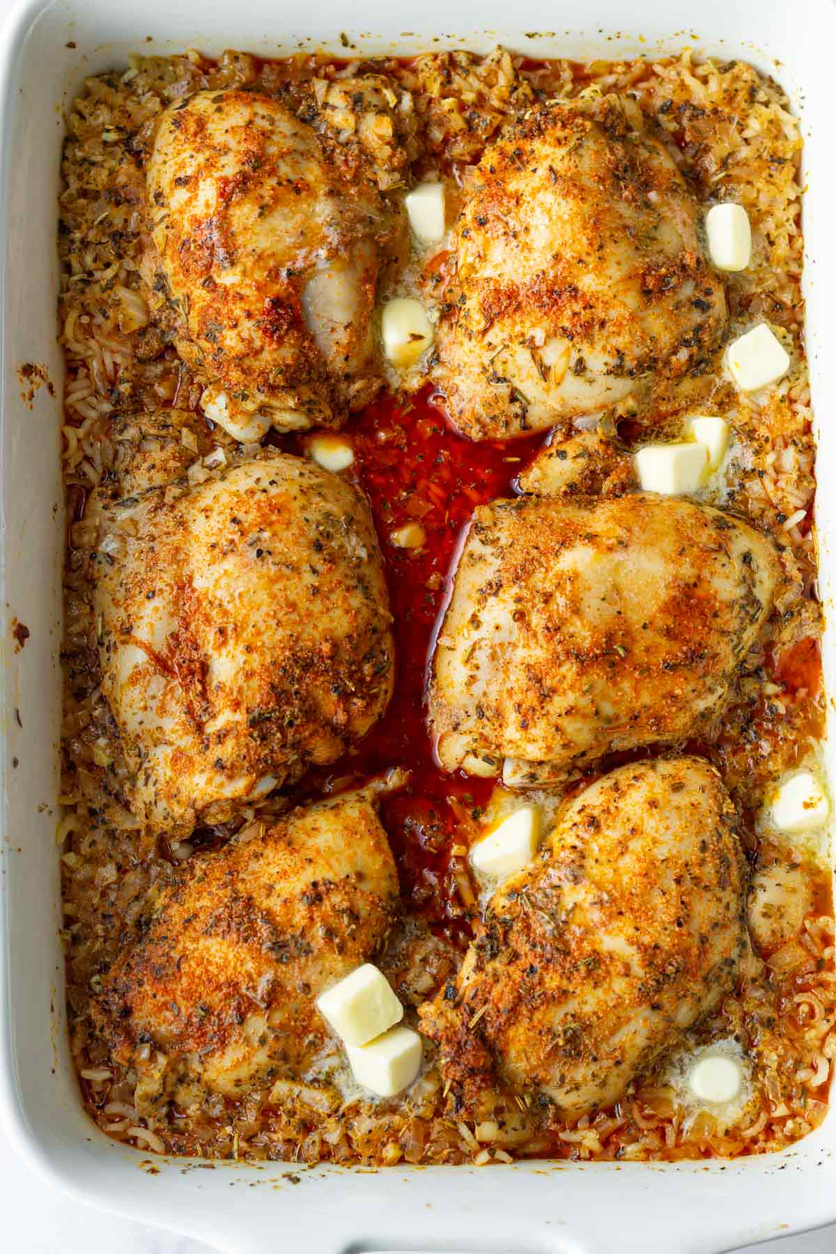 chicken and rice bake after uncovering with added butter